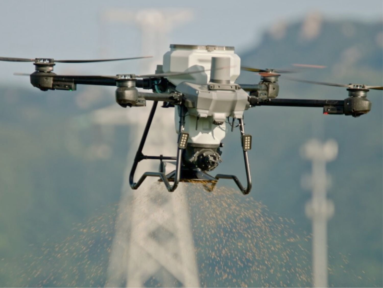 DJI Agras T25P agricultural spraying drone in field Sri Lanka